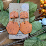 E033 Leaf into Fall Orange Clay hand-painted Earrings